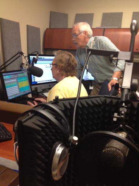 Diane Hampton, Mid-South Community College’s vice president of institutional advancement, and KWEM station manager John Bennett check programming Wednesday in preparation for the radio station’s return to the airwaves today in West Memphis. Listeners can find the station at www.kwemradio.com. 