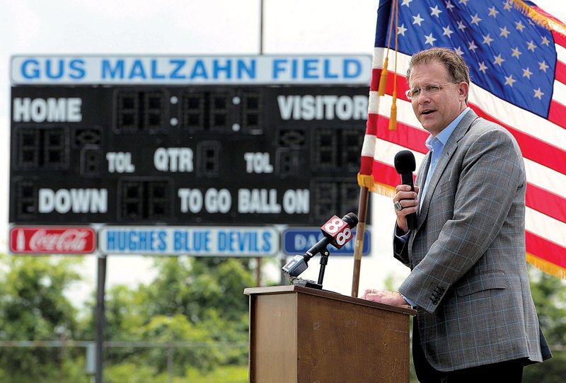 Auburn Coach Gus Malzahn of Fort Smith speaks at a dedication of a field named in his honor Monday at Hughes High School. Malzahn’s first head coaching job was at Hughes and he led the Blue Devils to the Class AA championship game in 1994. 