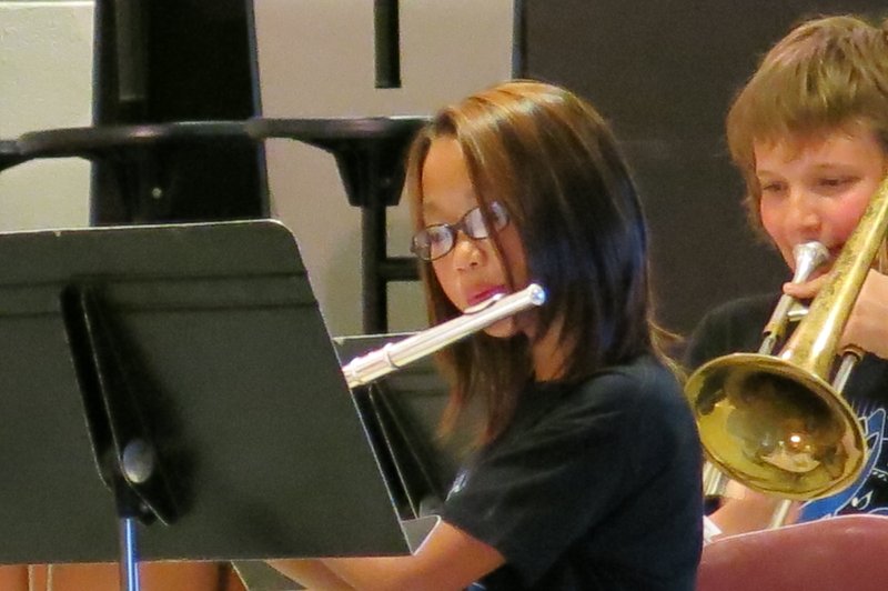 Photo by Mike Eckels Emmy Lee plays flute during the beginning-band concert May 22. The band is comprised of students from Northside Elementary sixth-grade classes.