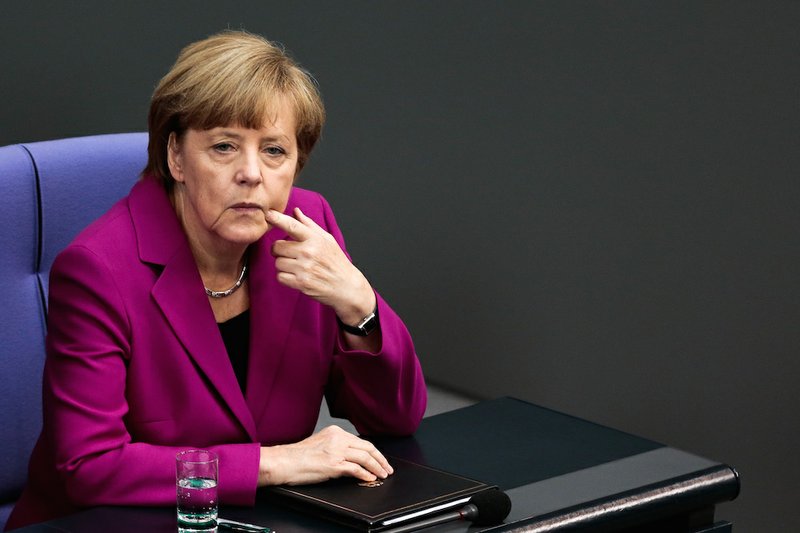German Chancellor Angela Merkel sits ahead of speaking at the G7 summit in Berlin on Wednesday, June 4, 2014. 