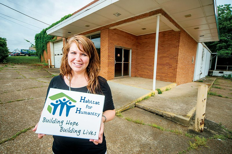 Shalyn Carlile, executive director for Habitat for Humanity of Independence County, is shown in front of the future location for the new Habitat store in Batesville.