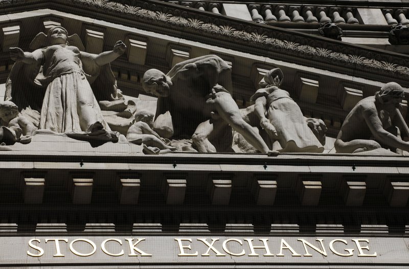 This July 15, 2013 file photo shows the New York Stock Exchange in New York. Stocks moved slightly lower in early trading Wednesday, June 4, 2014, after a private jobs report suggested that U.S. employers pulled back on hiring last month. 