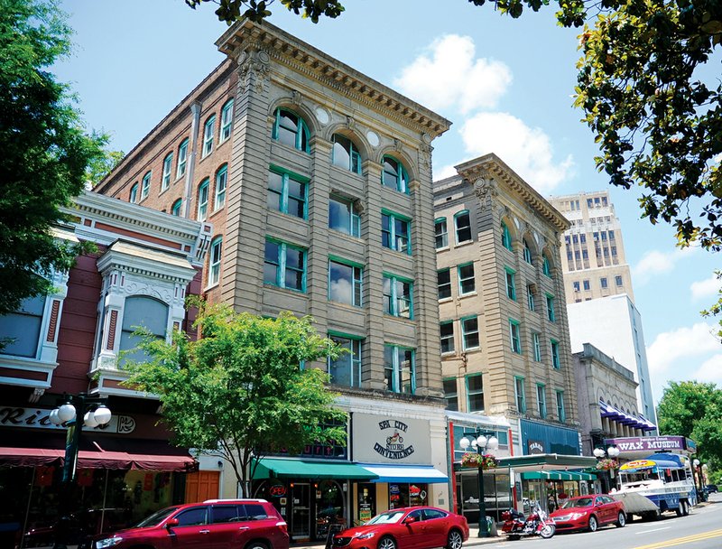 The Sentinel-Record/Mara Kuhn BUILDINGS SOLD: The Wheatley family announced Wednesday that it had sold the Dugan-Stuart Building, 344 Central Ave., pictured here, and the Thompson Building, 422 Central Ave., to TKZ LLC.