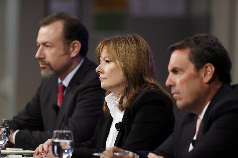 General Motors President Dan Ammann (from left), Chief Executive Officer Mary Barra and Executive Vice President Mark Reuss hold a news conference Thursday in Warren, Mich.