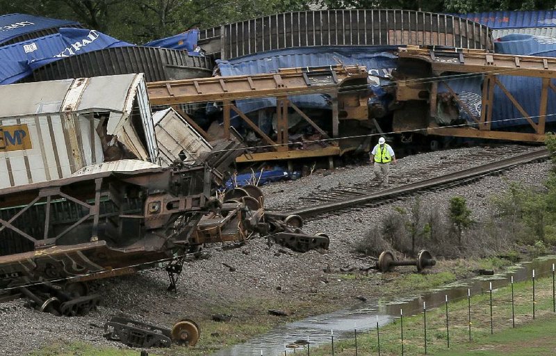 High winds from a powerful storm system knocked out power Thursday to thousands of homes and businesses, and blew a freight train off its tracks along U.S. 49 at the Poinsett-Craighead county line.