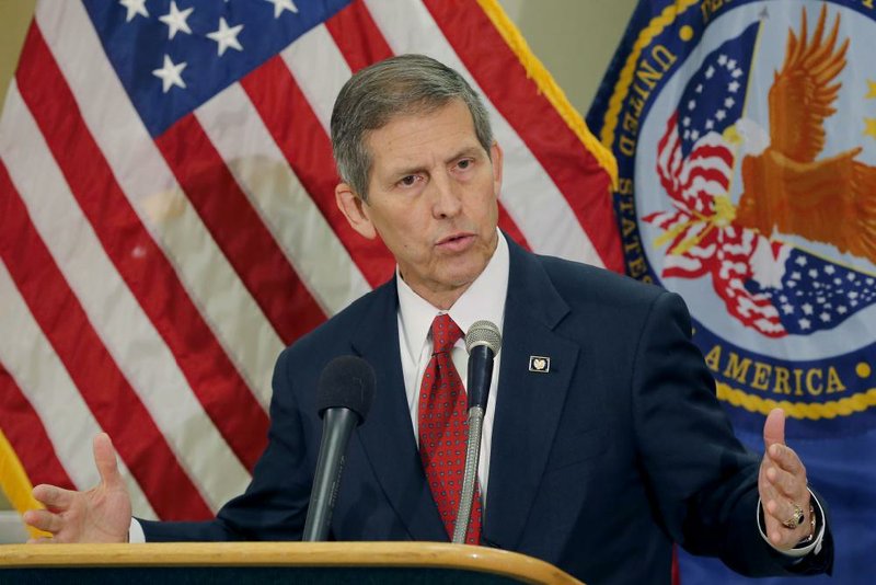 Acting Secretary of Veterans Affairs Sloan Gibson speaks Thursday in Phoenix where he made his first visit since taking over the agency amid an investigation that found 1,700 veterans were kept off the official waiting list for care at the troubled Arizona hospital.