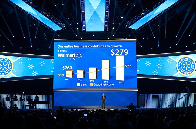 Charles Holley, chief financial officer of Wal-Mart Stores, speaks during the annual Wal-Mart shareholders meeting in Fayetteville on Friday, June 6, 2014. 