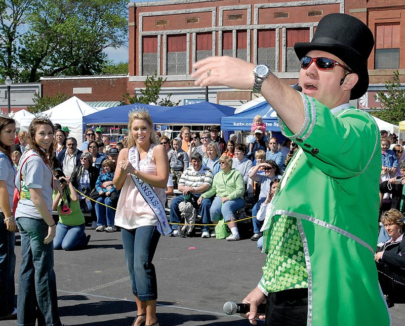 Toad Master Brian Ratliff stands on Parkway Street in downtown Conway during the toad races at a previous Toad Suck Daze festival. Several downtown Conway businesses signed a petition asking to meet with the Conway Area Chamber of Commerce to discuss moving the festival to the Conway Expo Center and Fairgrounds, or to find another solution to problems they said are caused by the event. Many business people have reiterated that their intent is not to end Toad Suck Daze.