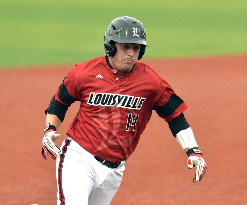 Louisville's Kyle Gibson rounds third on his way home to score against Kennesaw State in the third inning of an NCAA college baseball tournament super regional game in Louisville, Ky., Saturday, June 7, 2014. 