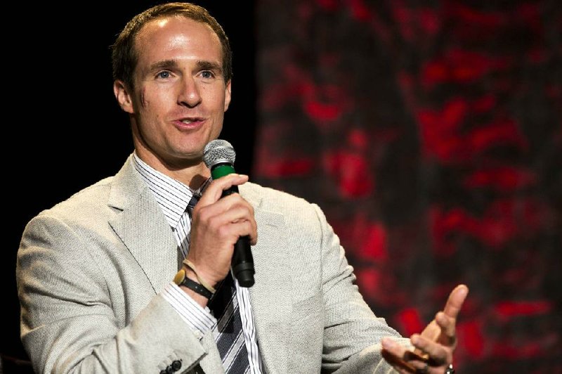 Drew Brees speaks at the 2014 Arkansas Preps Banquet June 7, 2014 at the State House Convention Center in Little Rock. 