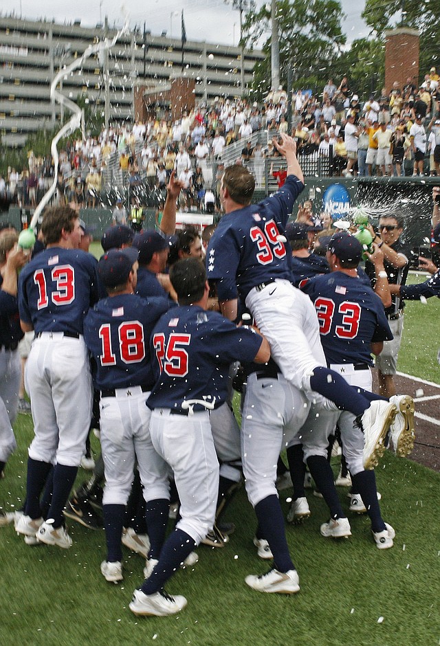 Vanderbilt players celebrate their 12-5 victory over Stanford after an NCAA college baseball tournament super regional game Sunday, June 8, 2014, in Nashville, Tenn. 