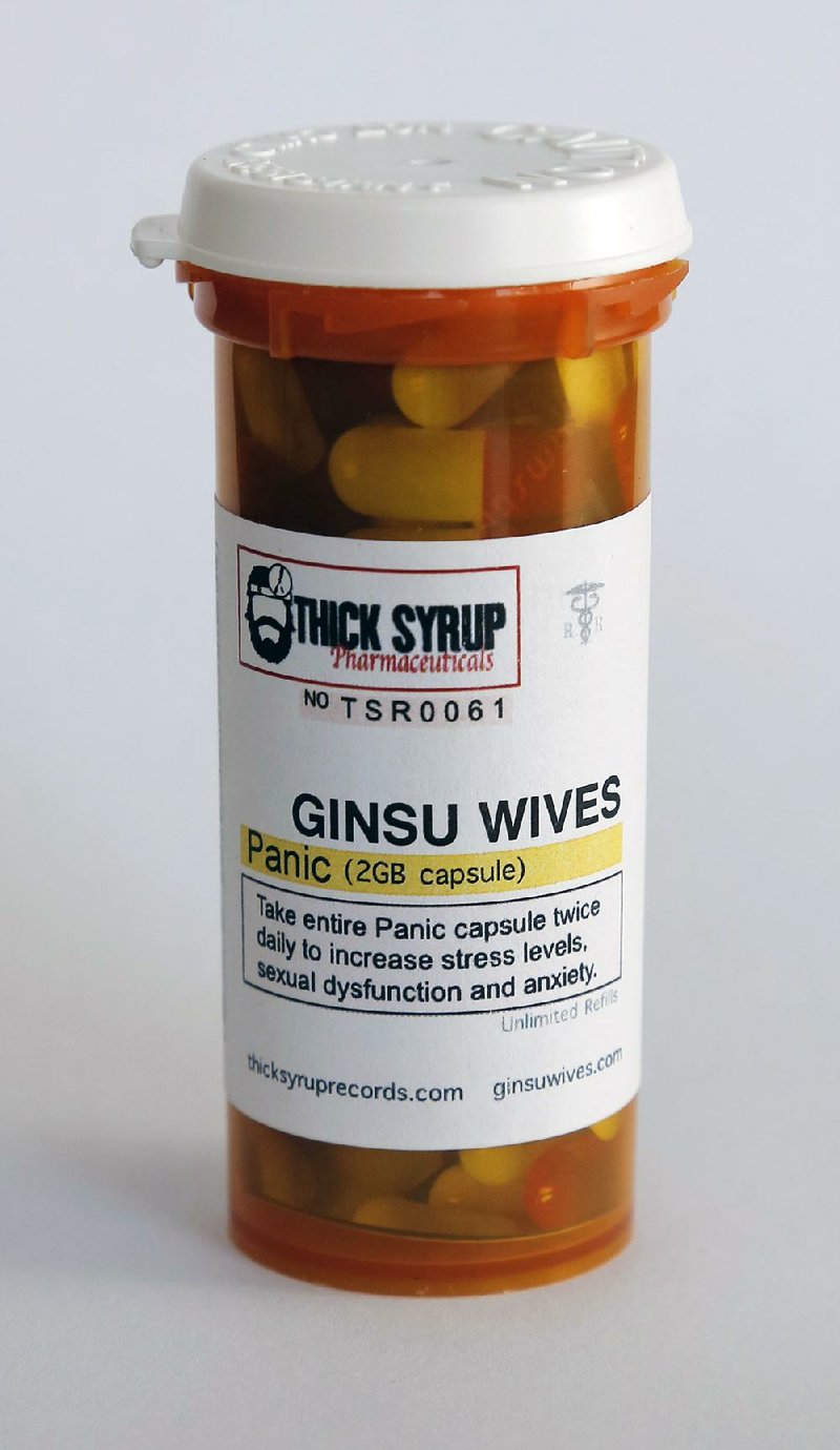 The band Ginsu Wives has the cure for what ails you in the form of the new album, Panic, which comes as a flash drive in this pill bottle.