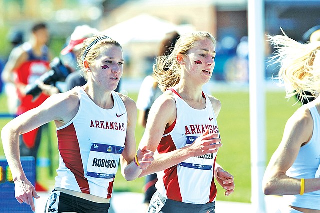 Courtesy Photo Grace Heymsfield, right, has continued to have a very successful cross country and track career at Arkansas after starring at Elkins High School. She is considered one of the top female steeplechasers in the country and will compete beginning Wednesday at the NCAA Outdoor Track and Field Championships in Eugene, Ore.