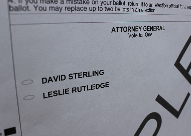 A sample ballot posted outside a Little Rock polling site lists the two candidates for attorney general, the only statewide race in Tuesday's runoff election.