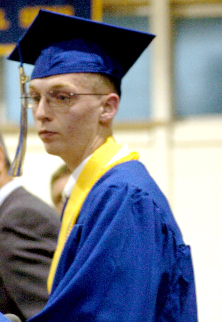 Clements delivering a closing prayer at Decatur High School Graduation on May 17.