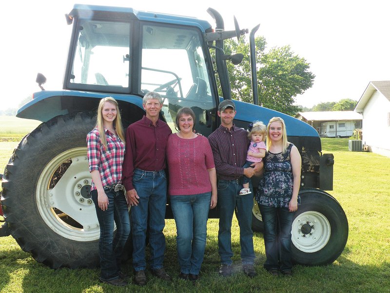 The Randy Clark family of Pottsville has been named 2014 Pope County Farm Family of the Year. Family members are, from left, Ashlyn, Randy, Laura, Nathan, 14-month-old Alexis and Nina Clark.