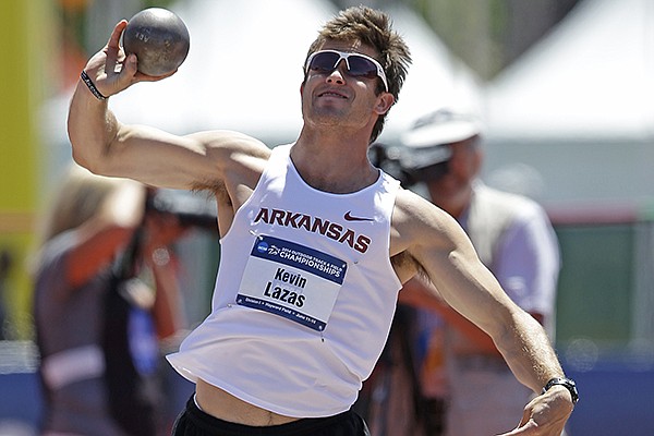 Arkansas' Kevin Lazas throws during the decathlon shot put event at the NCAA outdoor track and field championships on Wednesday, June 11, 2014, in Eugene, Ore. (AP Photo/Rick Bowmer)