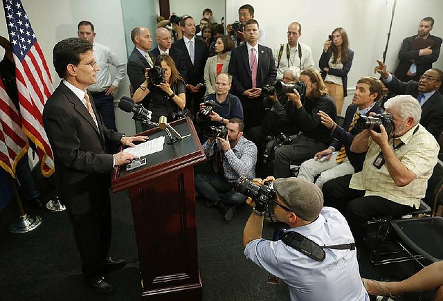 After a private meeting with fellow Republicans on Wednesday at the Capitol, Eric Cantor explains at a news conference his decision to resign as House majority leader.