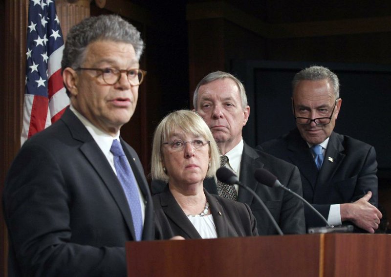 Sen. Al Franken, (from left) accompanied by fellow Democratic Sens. Patty Murray, Richard Durbin and Charles Schumer, talks to reporters Wednesday about the student-loan legislation that failed to gain enough votes to advance.