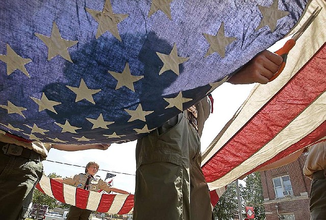 A flag retirement ceremony by the Boy Scouts and Girl Scouts is just one of the activities at Arkansas Flag and Banner’s Flag Day Celebration on Saturday.