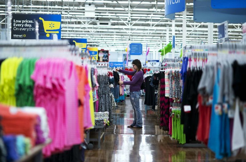 Sales at U.S. department and big-box stores, such as this Wal-Mart in Rogers, fell in May by 0.6 percent. Overall retail sales rose a modest 0.3 percent for the month, the Commerce Department reported Thursday.