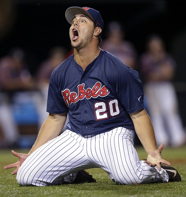 Mississippi pitcher Josh Laxer (20) celebrates after throwing the final out of an NCAA college baseball tournament super regional game against Louisiana Lafayette in Lafayette, La.,Monday, June 9, 2014. Mississippi won 10-4 to advance to the College World Series.