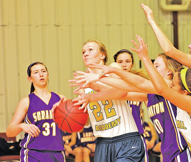  File Photo Michael Woods Becca Christie of Haas Hall is fouled by Scranton defender Kendra Bailey as she tries to drive to the hoop during a game Jan. 29 against Scranton in Fayetteville.