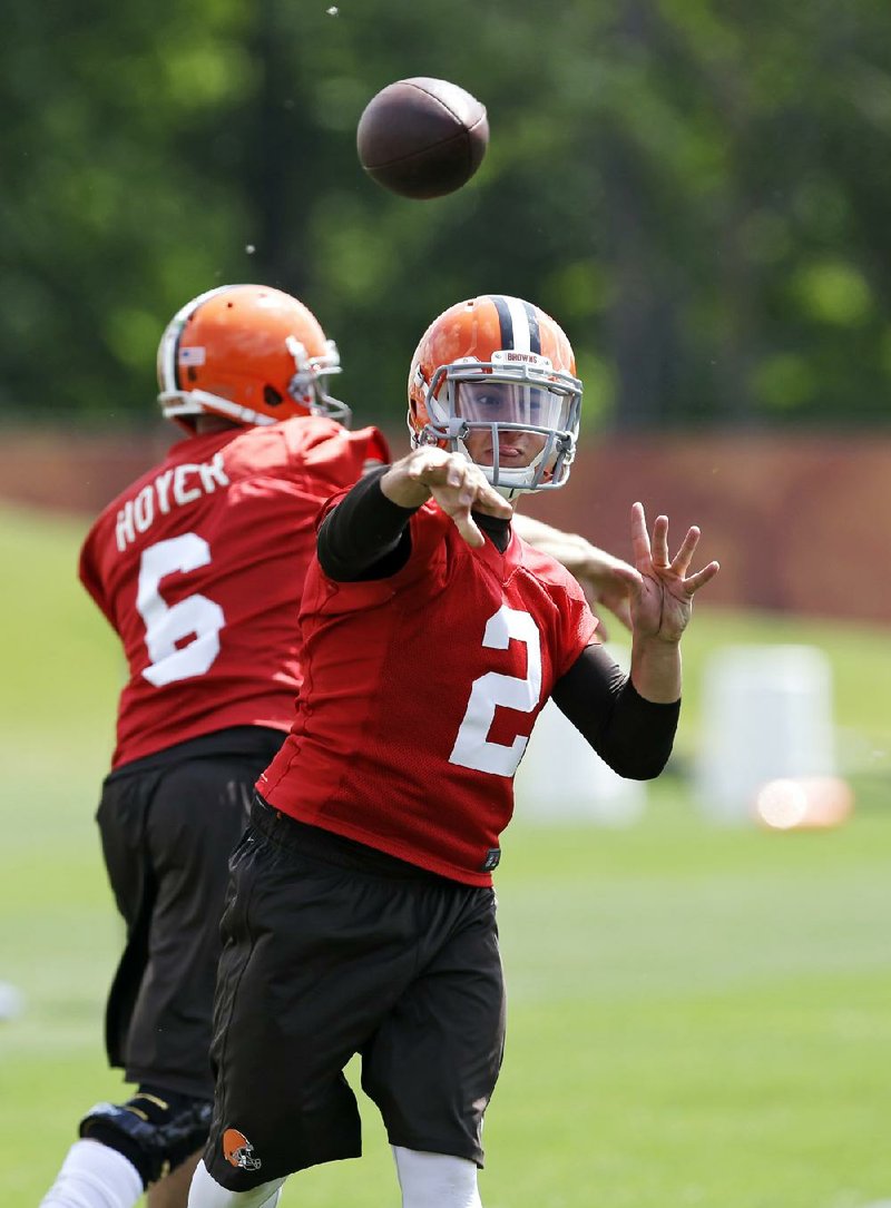 George Diaz of the Orlando Sentinel predicts rookie Johnny Manziel (above) will start at quarterback in the Cleveland Browns’ season opener in September.