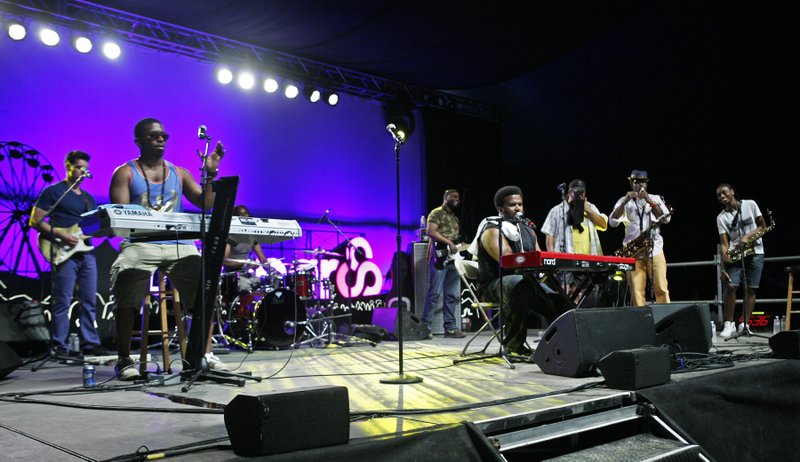 Craig Robinson and his seven-piece band, The Nasty Delicious, perform at the Bonnaroo Music and Arts Festival on Saturday, June 14, 2014, in Manchester, Tenn.