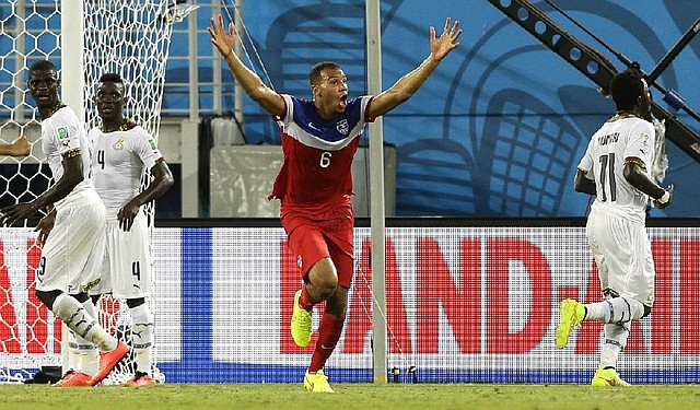 John Brooks of the United States celebrates after scoring in the 86th minute of the Americans’ 2-1 World Cup victory over Ghana on Monday in Natal, Brazil. The winning goal came just four minutes after Ghana had tied the game on a goal by Andre Ayew.