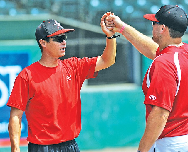 FILE PHOTO ANDY SHUPE Mitch Cameron, left, Prairie Grove coach, is again heading an AR Rawlings Prospects team, which will participate this week in the Hawg Baseball Showcase.