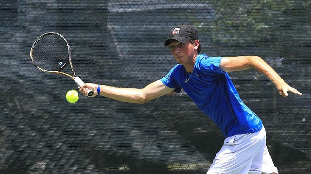 Max Mendelsohn of Little Rock returns a shot in a round of 16 loss to Brandon Freestone of Roswell, Ga., in the USTA Southern Closed 16s on Tuesday at Rebsamen Tennis Center in Little Rock. Mendelsohn lost the first set 6-0 and retired behind 2-0 in the second with an elbow injury.