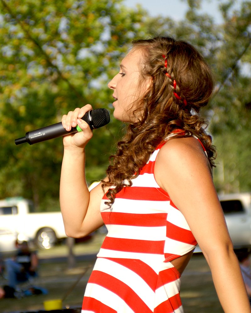 Photo by Randy Moll Kaylin Cripps performs at a past July 4 Freedom Festival in Gentry and will perform with her band this year.