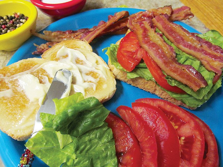 Bacon, lettuce and tomato sandwiches are perfect picnic food. The components can be cooked at home and packaged separately so the sandwich will not be soggy and will maintain the cool lettuce, crisp bacon and juicy tomato.