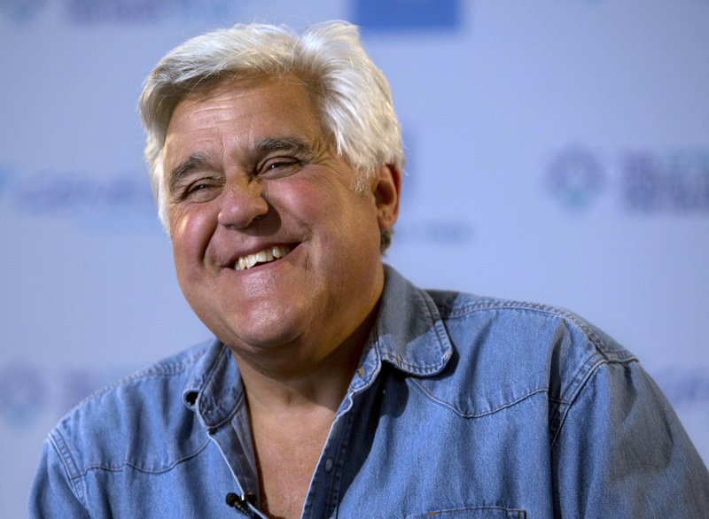 This May 21, 2014 file photo shows American comedian Jay Leno reacts during an interview with the Associated Press in Jerusalem. Newly retired from The Tonight Show, Leno is now being awarded the nations top humor prize by the Kennedy Center for the Performing Arts. Leno will be honored with the Mark Twain Prize for American Humor by his fellow comedians in a performance Oct. 19 in Washington. The show will be broadcast nationally in November on PBS.