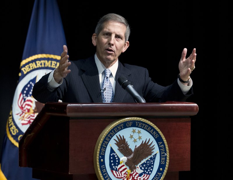 Acting Veterans Affairs Secretary Sloan Gibson speaks during a news conference at the VA Medical Center in Washington, Wednesday, June 18, 2014. The Veterans Affairs Department (VA) release the results from its Nationwide Access Audit, along with facility level patient access data for all Veterans health facilities.