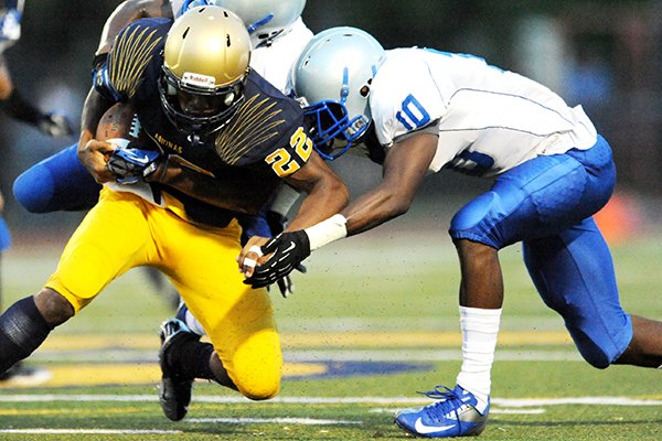 Dillard's Randy Ramsey (10) makes a tackle during a 2012 game against St. Thomas Aquinas in Fort Lauderdale, Fla. 