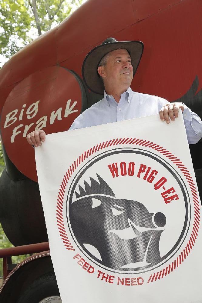 Arkansas Democrat-Gazette/JOHN SYKES JR - HIGH PROFILE VOLUNTEER - Buddy Rhoads owns Jennings Osborne's big BBQ grill and has continued its charitable heritage. 