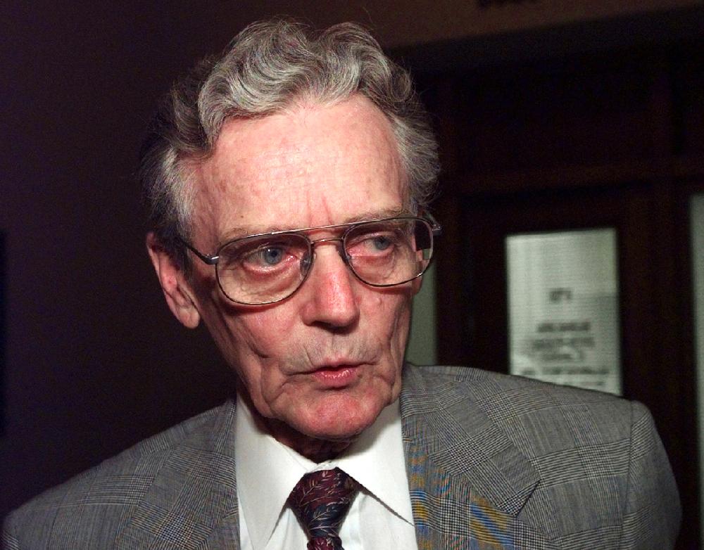 Rep. John Miller, D-Melbourne, talks to reporters after a meeting of a Legislative Council subcommittee at the Arkansas State Capitol in Little Rock on Wednesday, Jan. 7, 1998. Miller opposes stricter limits on people applying for state contracts and reporting relatives in government. (AP Photo/Danny Johnston)