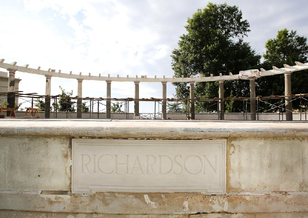 NWA Media/DAVID GOTTSCHALK - 6/19/14 - Renovation work, including stucco work on the columns by Martin‚Äôs Painting and Stucco Company of Springdale, continues on the University of Arkansas Chi Omega Greek Theatre on the campus in Fayetteville Thursday June 19, 2014. The theatre was was completed in the summer of 1930 and listed on the National Register of Historic Places in 1992.