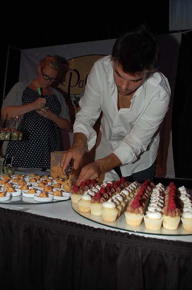 Georges “Georgie” Launet, now head pizzaolo for Pizzeria Santa Lucia, prepares a catering tray for a 2012 benefit.