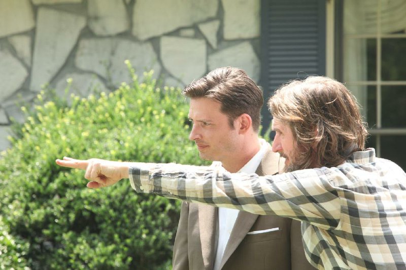 Series star Aden Young (left) and creator Ray McKinnon discuss a scene in Sundance TV’s Rectify.