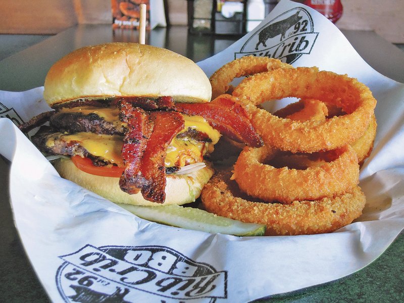 Fire-grilled burgers have a seasoned, smokey flavor and are a top-seller at Rib Crib.