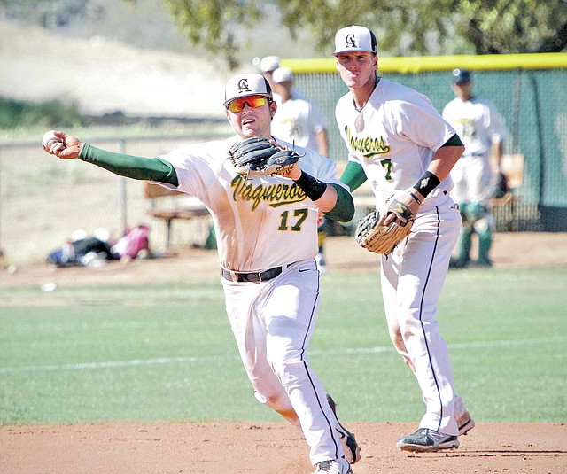  Casa Grande Dispatch Steven King David Petrino, former Shiloh Christian standout, fields a bunt and throws to first for an out on April 16 during Central Arizona College&#8217;s game against South Mountain at CAC in Coolidge, Ariz..