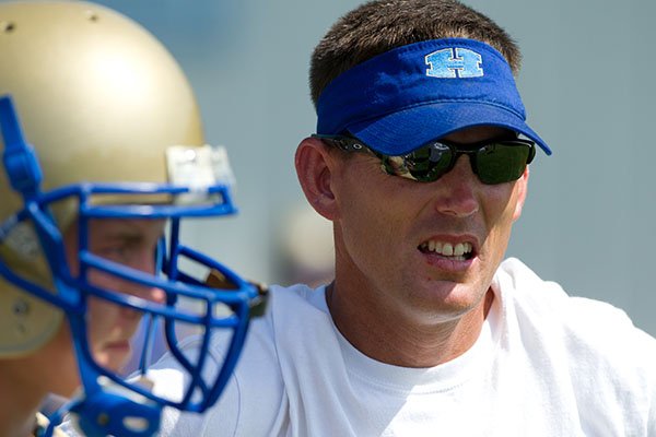 Harrison coach Adam DePriest watches during the Shootout of the South on Friday, June 15, 2012 in Little Rock. 