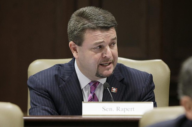 Sen. Jason Rapert, R-Conway, presents a resolution during a meeting of the Legislative Council in Little Rock, Ark., Friday, June 20, 2014. The Council approved the non-binding measure that urges the state Supreme Court to uphold a voter-approved ban on same-sex marriages. (AP Photo/Danny Johnston)