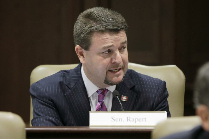 Sen. Jason Rapert, R-Conway, presents a resolution during a meeting of the Legislative Council in Little Rock, Ark., Friday, June 20, 2014. The Council approved the non-binding measure that urges the state Supreme Court to uphold a voter-approved ban on same-sex marriages. (AP Photo/Danny Johnston)