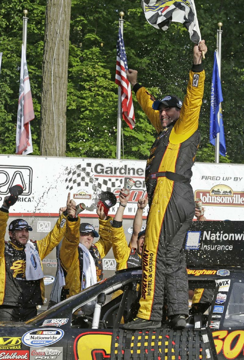 Brendan Gaughan won the Gardner Denver 200 at Road America in Elkhart Lake, Wis., on Saturday, edging Alex Tagliani by 0.82 seconds.