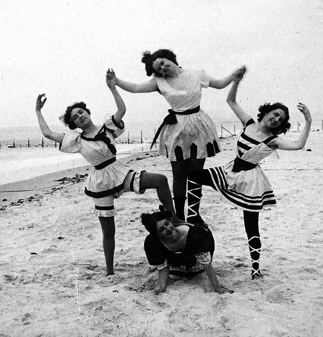Swimsuit styles have changed a great deal over the years, as this photo, taken at Coney Island, N.Y. around 1898, shows. Illustrates KIDSPOST-SWIMSUITS (category l), by Marylou Tousignant, special to The Washington Post. Moved Monday June 2, 2014. (MUST CREDIT: Strohmeyer &amp; Wyman/Library of Congress)
