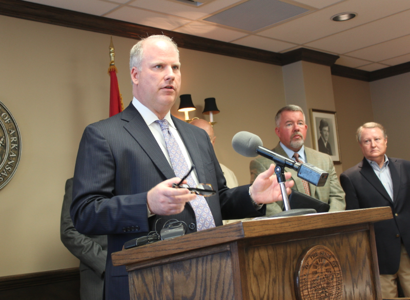Attorney General Dustin McDaniel speaks at a news conference Monday in Little Rock.